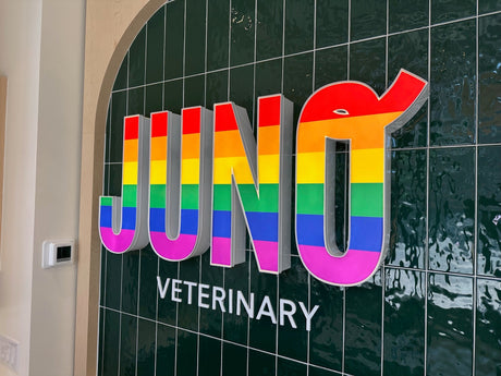 Rainbow vinyl lettering for Pride Month at Juno Veterinary locations