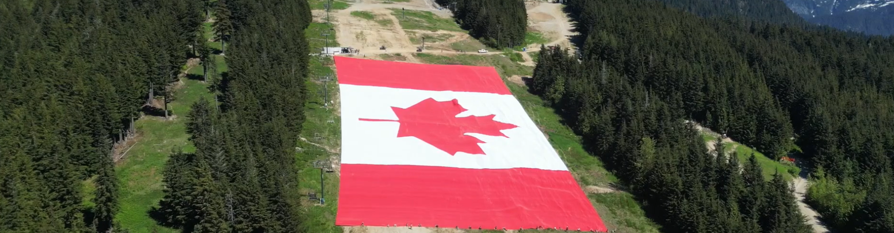 Breaking Records on the Mountain: How We Unfurled the World’s Largest Flag on Grouse Mountain