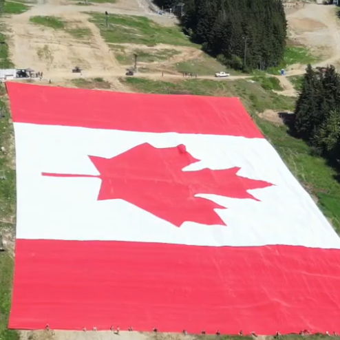Breaking Records on the Mountain: How We Unfurled the World’s Largest Flag on Grouse Mountain