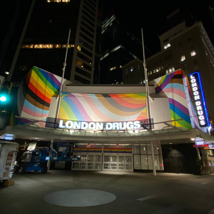 Pride fabric banner on corner of Granville and Georgia street in Downtown Vancouver